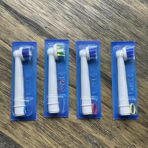 Genuine Oral-B Replacement Electric Toothbrush Head New Lot of 4 (4 704 132-00)